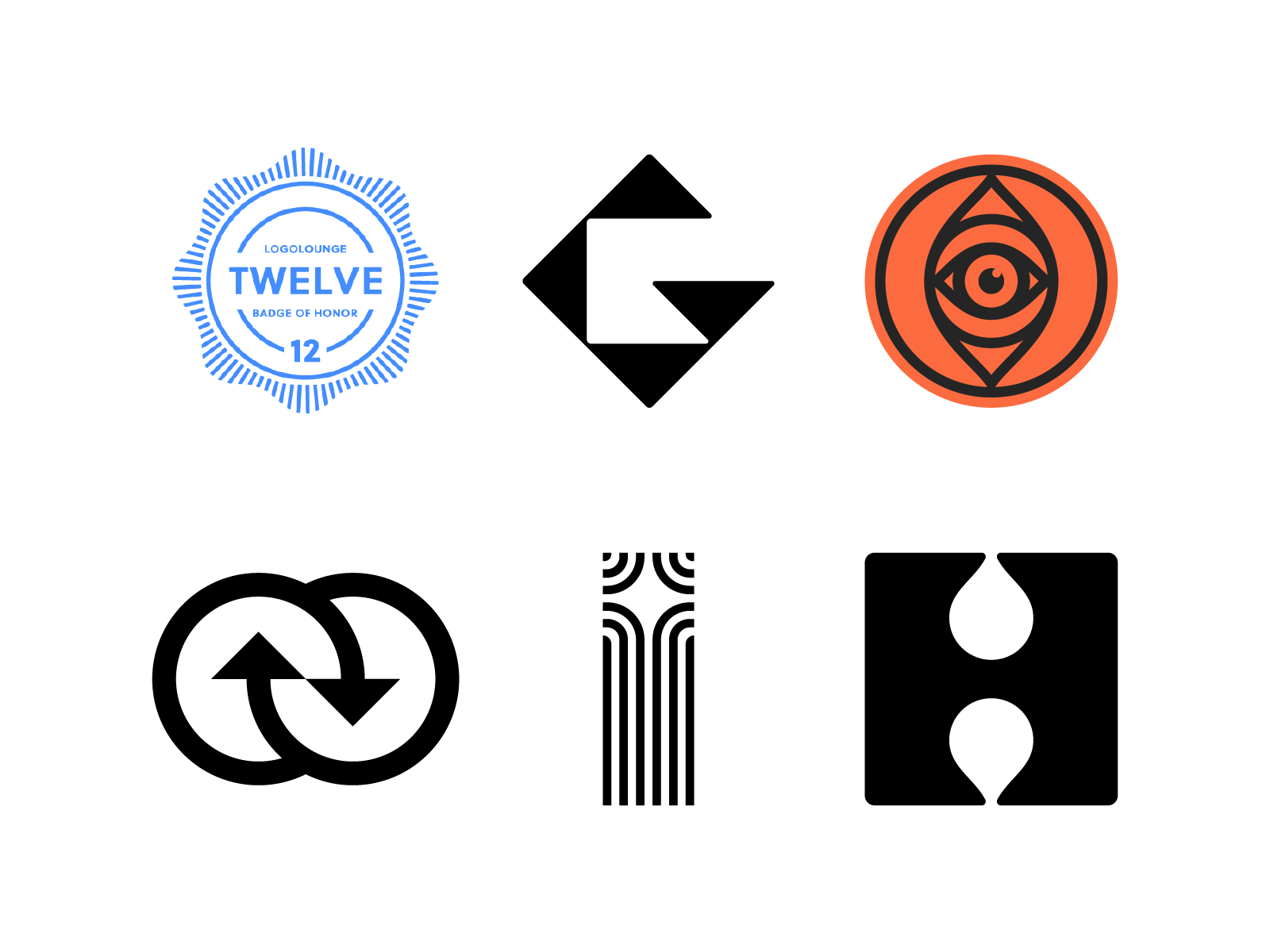 Logo Lounge book 12 negative space logo drop letter logo award logolou.png